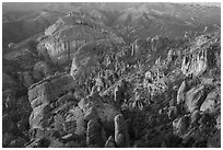 Innumerable rock spires and cliffs seen at sunset. Pinnacles National Park ( black and white)