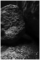 Running water, boulders, Bear Gulch cave. Pinnacles National Park ( black and white)