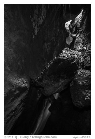 Lower Bear Gulch cave with waterfall and jammed boulders. Pinnacles National Park (black and white)