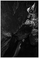 Lower Bear Gulch cave with waterfall and jammed boulders. Pinnacles National Park ( black and white)