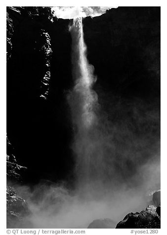 Bridalveil Falls as sun reaches upper shaft of water. Yosemite National Park (black and white)
