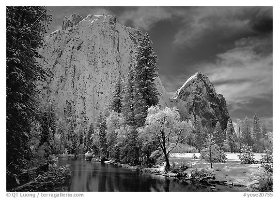 Cathedral rocks and Merced River with fresh snow. Yosemite National Park, California, USA.