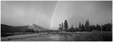 Evening storm with rainbow over Tuolumne Meadows. Yosemite National Park (Panoramic black and white)