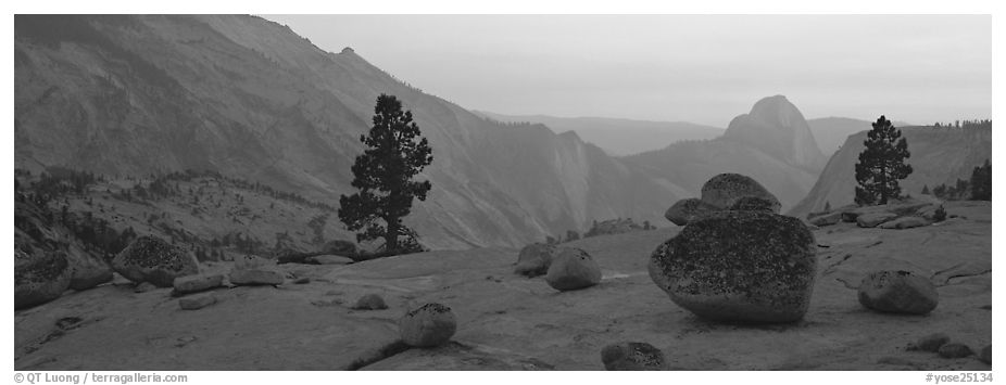 Erratic glacial boulders and Half-Dome at sunset. Yosemite National Park (black and white)