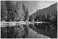 Merced River with fall colors and Sentinel Rocks reflections. Yosemite National Park ( black and white)