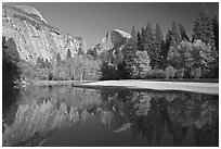 North Dome and Half Dome reflected in Merced River. Yosemite National Park ( black and white)