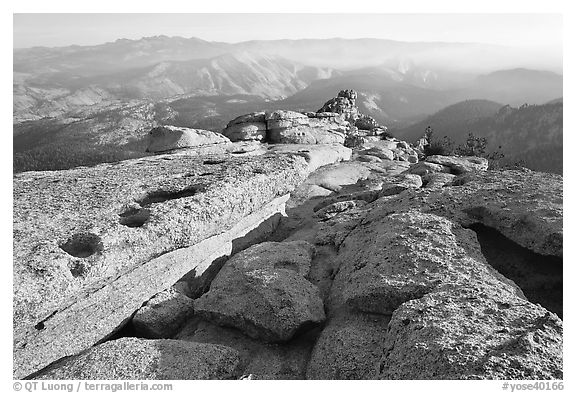Summit of Mount Hoffman with hazy Yosemite Valley in the distance. Yosemite National Park, California, USA.