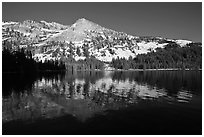 Tenaya Lake, with partly snow-covered peak reflected. Yosemite National Park ( black and white)