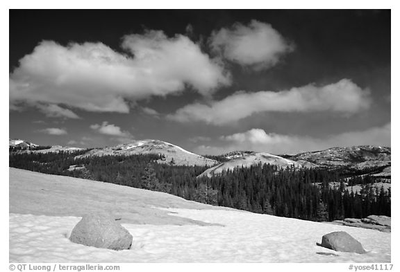 Snow on slab, boulders, and distant domes, Tuolumne Meadows. Yosemite National Park (black and white)