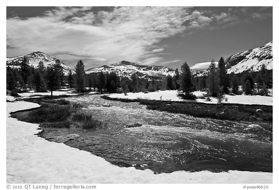 Creek flowing in snow-covered high country landscape. Yosemite National Park (black and white)