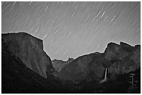 Yosemite Valley by night with star trails. Yosemite National Park ( black and white)