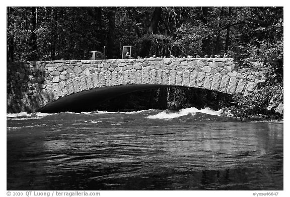 Pohono Bridge with high waters. Yosemite National Park (black and white)