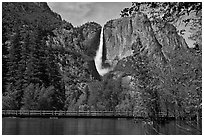 High waters of the Merced River under the Swinging Bridge. Yosemite National Park ( black and white)