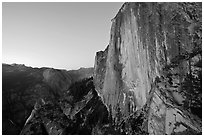 Hiker, Half-Dome and Tenaya Canyon from the Diving Board at dusk. Yosemite National Park ( black and white)