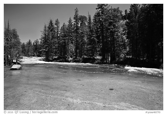 Merced River flowing over smooth granite. Yosemite National Park (black and white)