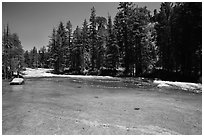 Merced River flowing over smooth granite. Yosemite National Park ( black and white)