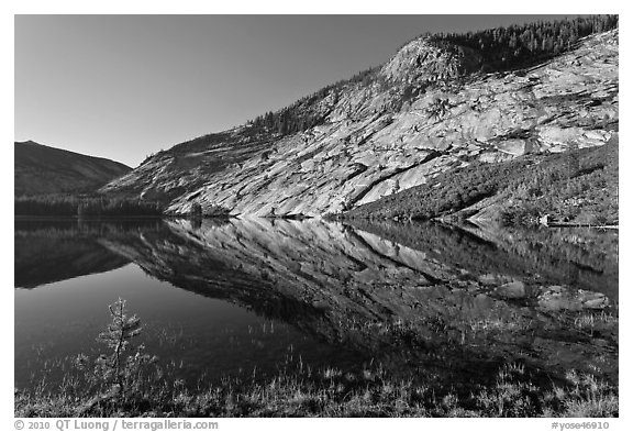 Peaks reflected in mirror-like waters, Merced Lake. Yosemite National Park (black and white)