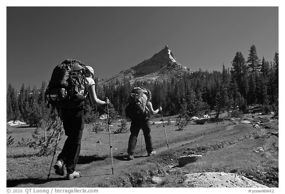 Women backpacking on John Muir Trail below Tressider Peak. Yosemite National Park (black and white)