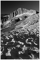 Neve with sun cups on the Sierra Crest, and North Peak. Yosemite National Park ( black and white)