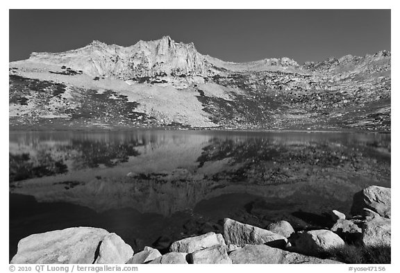 Rugged mountain reflected in Sierra Lake. Yosemite National Park (black and white)
