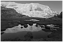 White mountain crest reflected in tarns. Yosemite National Park ( black and white)
