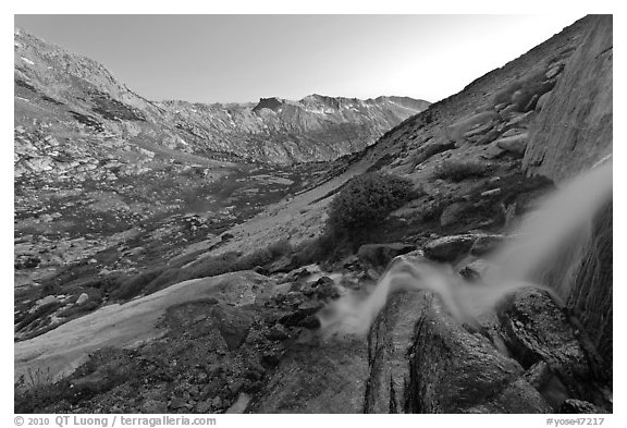 Waterfall and alpine valley at sunset. Yosemite National Park (black and white)