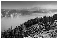 View from Sentinel Dome over fog-filed Valley. Yosemite National Park ( black and white)