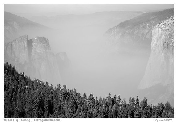 Smoky Yosemite Valley framed by Cathedral Rocks and El Capitan. Yosemite National Park (black and white)