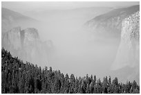 Smoky Yosemite Valley framed by Cathedral Rocks and El Capitan. Yosemite National Park ( black and white)