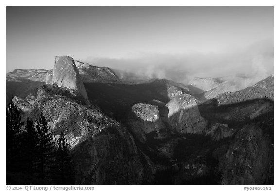 Half-Dome and forest fire from Washburn Point, late afternoon. Yosemite National Park (black and white)