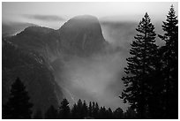 Liberty cap and smoke at night. Yosemite National Park ( black and white)