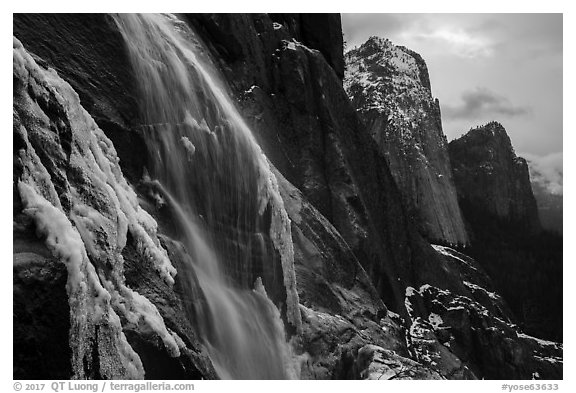 Seasonal waterfall and Cathedral Rocks in winter. Yosemite National Park (black and white)