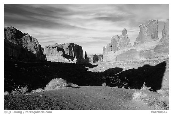 South park avenue, an open canyon flanked by sandstone skycrapers. Arches National Park (black and white)