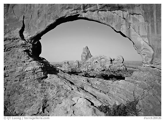 Turret Arch seen from rock opening. Arches National Park (black and white)