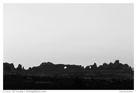 Windows Group backlit at sunrise. Arches National Park (black and white)