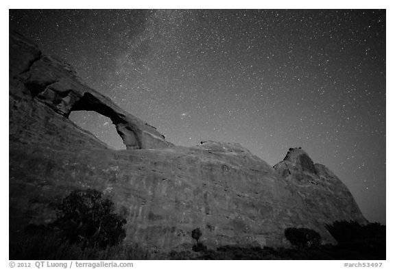 Skyline Arch at night with starry sky. Arches National Park, Utah, USA.