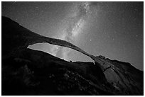 Landscape Arch bissected by Milky Way. Arches National Park, Utah, USA. (black and white)