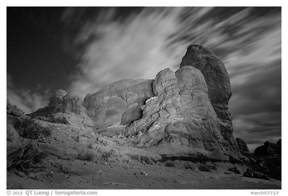 Turret Arch at night, lit by light. Arches National Park (black and white)