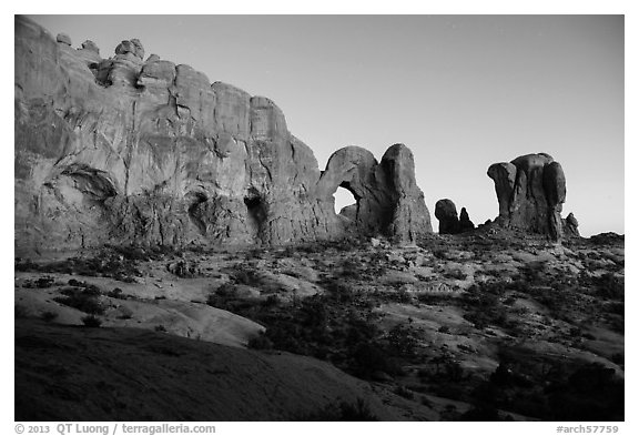 Cove of Arches, Double Arch, and Parade of Elephants at dusk. Arches National Park, Utah, USA.