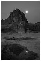 Courthouse tower and moon at night. Arches National Park ( black and white)