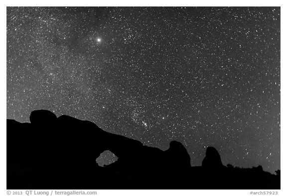 North Window under starry sky at night. Arches National Park (black and white)