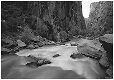 Gunisson River flowing beneath steep canyon walls. Black Canyon of the Gunnison National Park ( black and white)