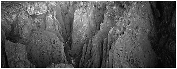 Startling depths and narrow opening. Black Canyon of the Gunnison National Park (Panoramic black and white)