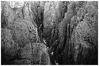 Deep and narrow gorge seen from Chasm view. Black Canyon of the Gunnison National Park, Colorado, USA. (black and white)