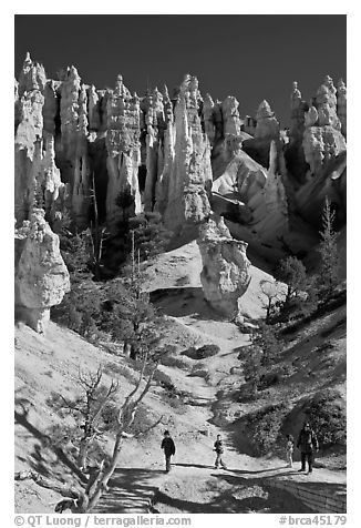 Hiker at the base of hoodoos. Bryce Canyon National Park (black and white)