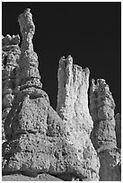 Hoodoos subject to chemical weathering by carbonic acid. Bryce Canyon National Park ( black and white)
