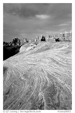 Sandstone striations and Needles near Elephant Hill, sunrise. Canyonlands National Park (black and white)