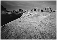 Sandstone swirls and Needles near Elephant Hill at sunrise, the Needles. Canyonlands National Park, Utah, USA. (black and white)