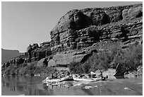 Rafts motoring upstream Colorado River. Canyonlands National Park ( black and white)
