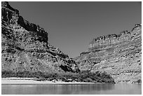 Cliffs towering above Confluence of Green and Colorado Rivers. Canyonlands National Park ( black and white)